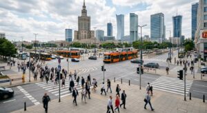 A professional, editorial-style photograph of a busy, modern Warsaw intersection during the day, fea